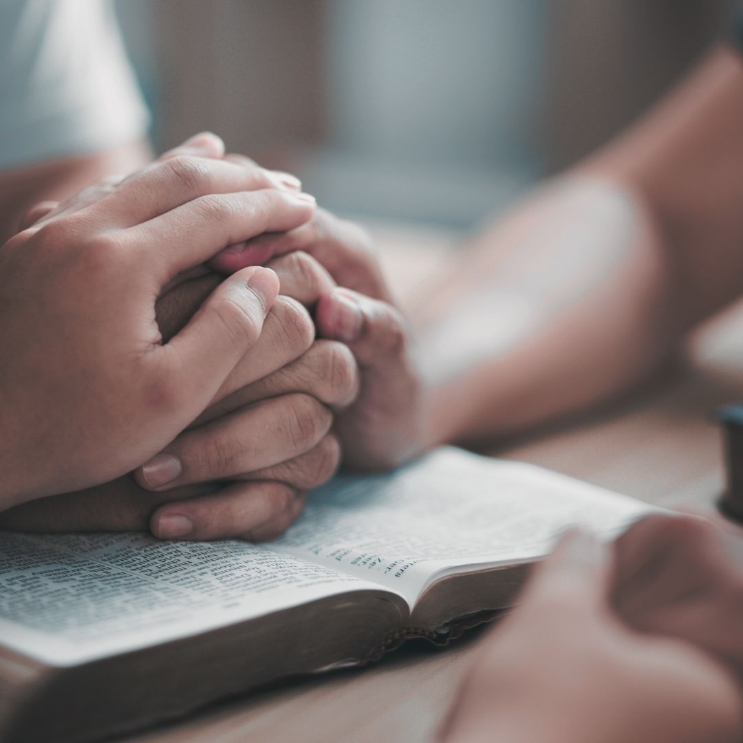 Holding hands in prayer for solutions to church challenges