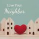 Love your neighbor heart between houses